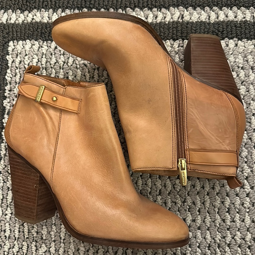 Coach brand ankle booties in tan, branded zipper on the side
